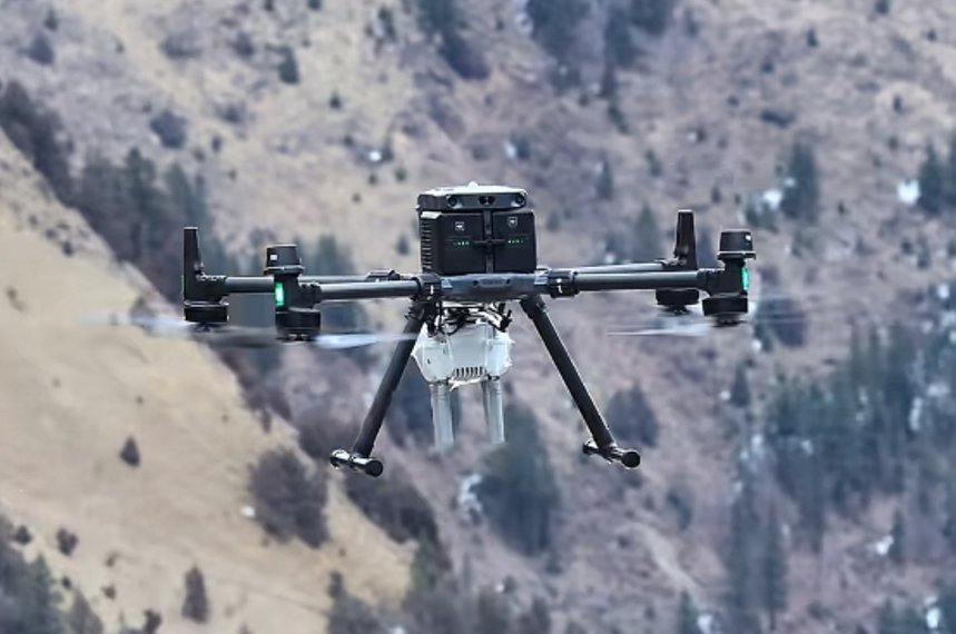 Drone with navigation spoofing device flying over mountains for anti - drone security